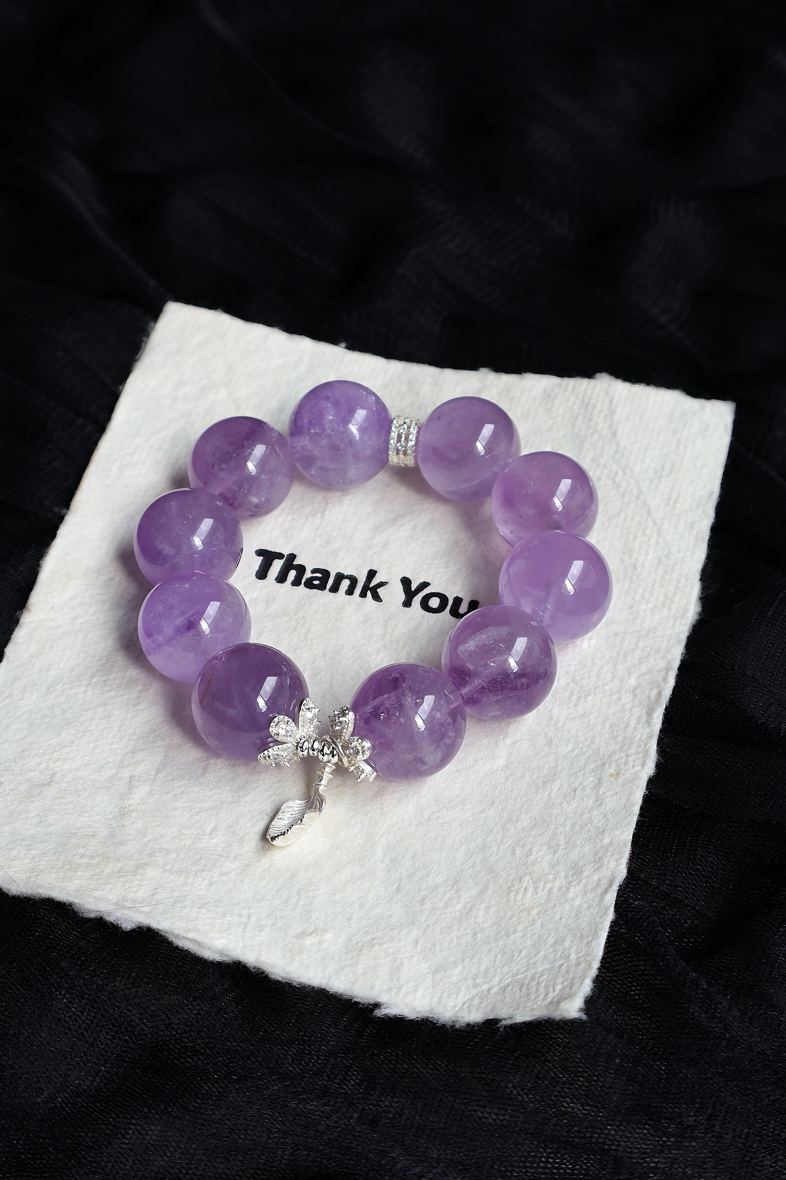Amethyst with silver accessories.